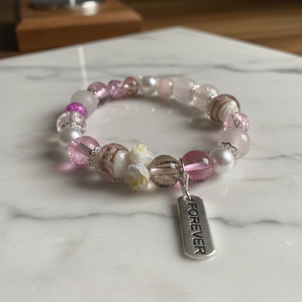 Elegant Pink Beaded Bracelet with Silver Charm